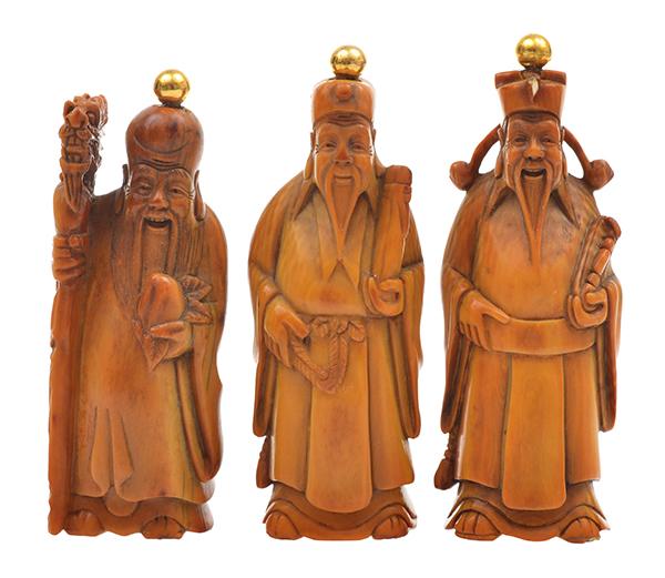 Appraisal: A GROUP OF THREE STAINED IVORY FU LU SHOU FIGURATIVE