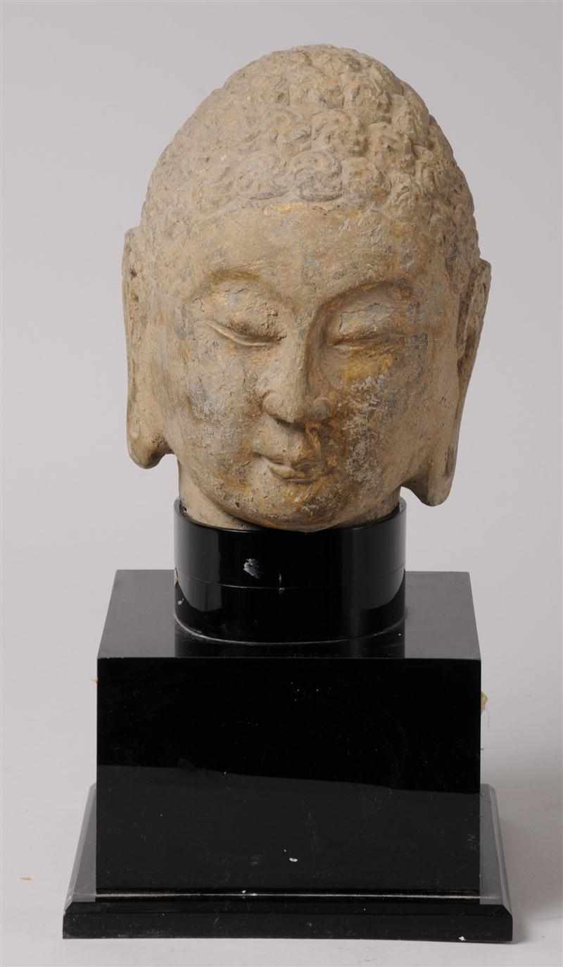 Appraisal: GANDHARA STYLE CARVED GREY SCHIST HEAD OF BUDDHA With traces