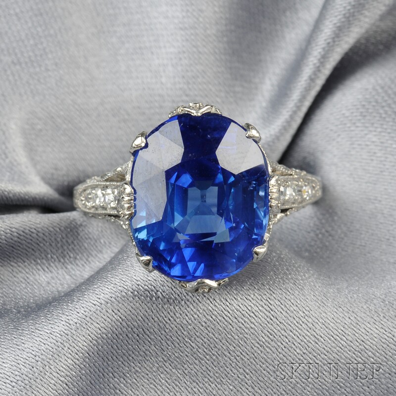 Appraisal: Sapphire and Diamond Ring set with a cushion-shaped sapphire measuring