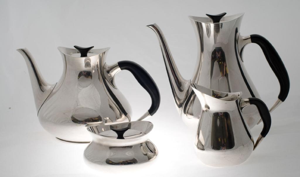 Appraisal: 's DANISH SILVER-PLATED FOUR-PIECE TEA SERVICE BY COHR -