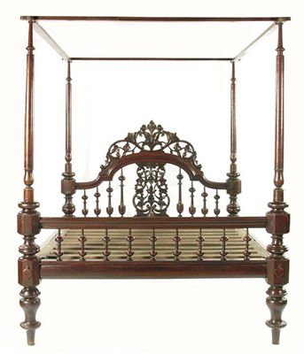 Appraisal: A Colonial hardwood four poster bed with turned and block