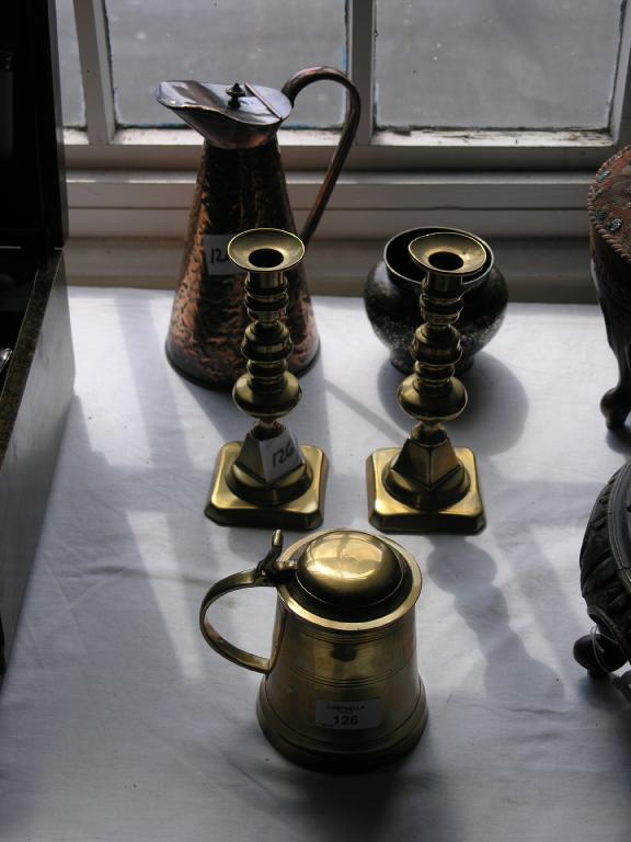 Appraisal: A brass tankard with cover a pair of brass baluster