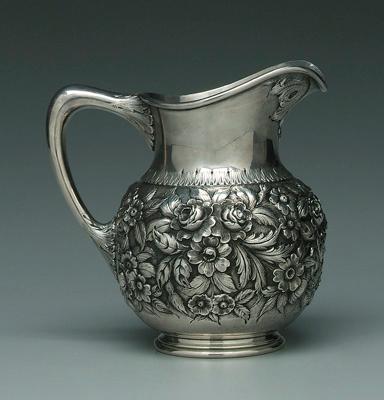 Appraisal: Repouss sterling water pitcher round with central wide floral repouss