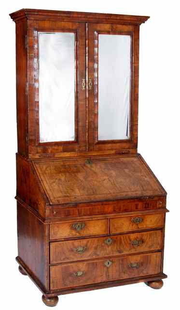 Appraisal: A QUEEN ANNE FIGURED WALNUT BUREAU BOOKCASE the top half