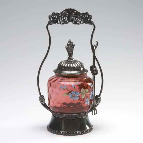 Appraisal: VICTORIAN PICKLE CASTOR In silver plate with enameled cranberry glass