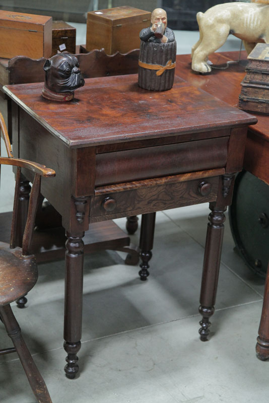 Appraisal: TWO DRAWER STAND Walnut and of interesting form having a