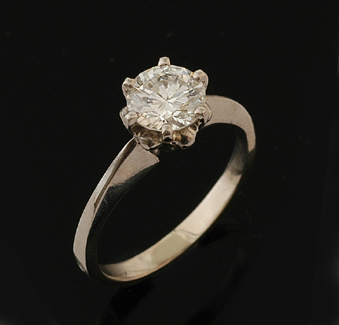 Appraisal: A diamond solitaire ring The round brilliant cut diamond weighing