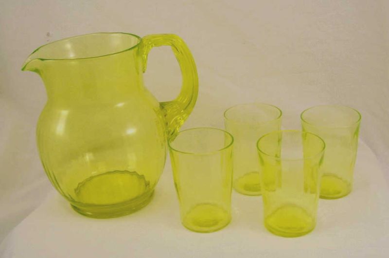 Appraisal: Vaseline Glass Pitcher Set Includes Water pitcher with applied handle