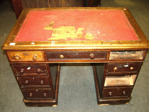 Appraisal: A Victorian mahogany pedestal desk the leather inset moulded top