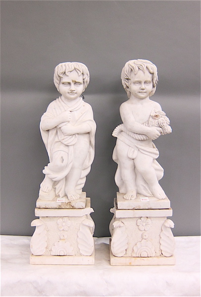 Appraisal: A PAIR OF MARBLE PUTTO STATUES Italian School th century