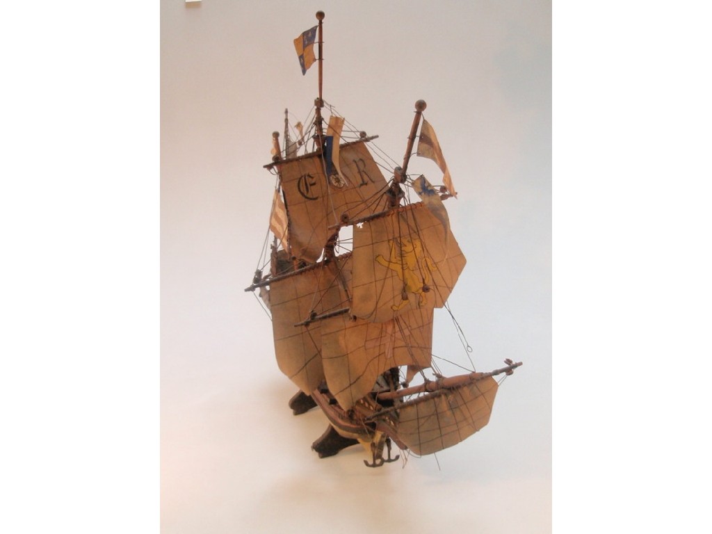 Appraisal: A model of a full mast gun ship cm long