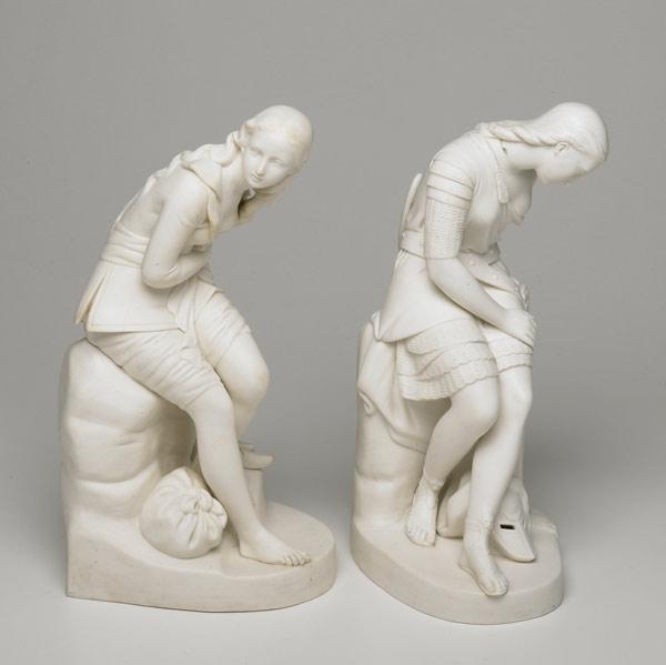 Appraisal: PARIAN FIGURES Pair of classical figures of a man and