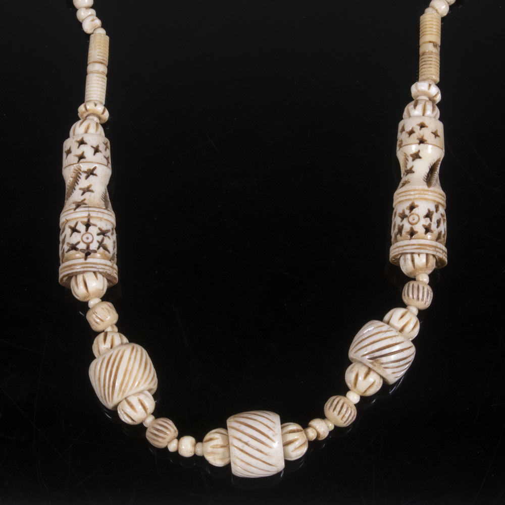 Appraisal: TIBETAN BONE NECKLACE Single Stand Necklace of assorted carved bone