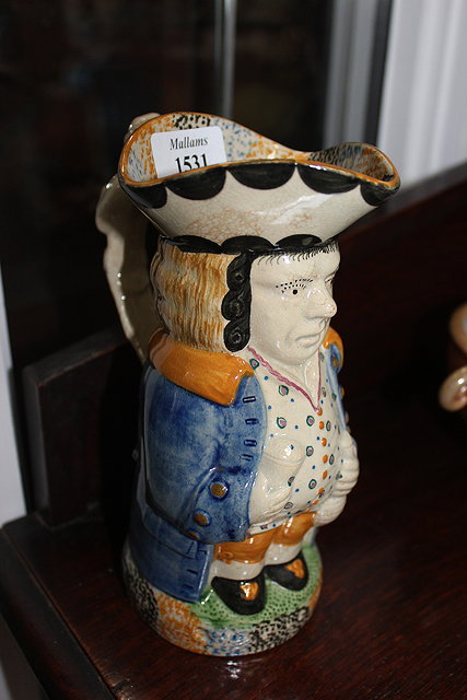 Appraisal: A PRATTWARE TYPE POTTERY TOBY JUG cm high