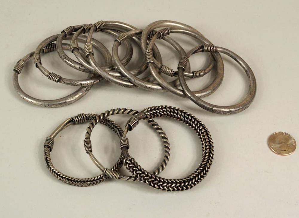 Appraisal: Group Chinese Miao Culture Silver Bangles Group of twelve Chinese