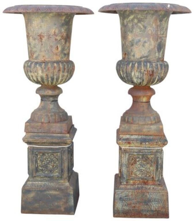 Appraisal: pair Cast iron campana-form garden urn planters having egg-and-dart trim