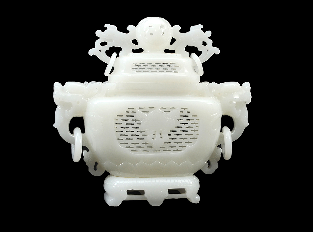 Appraisal: CHINESE CARVED WHITE JADE OPENWORK CENSER Carved white jade or