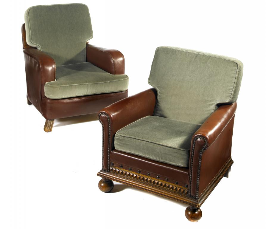 Appraisal: TWO CLOSE-NAILED BROWN HIDE ARMCHAIRS one with oak dog tooth