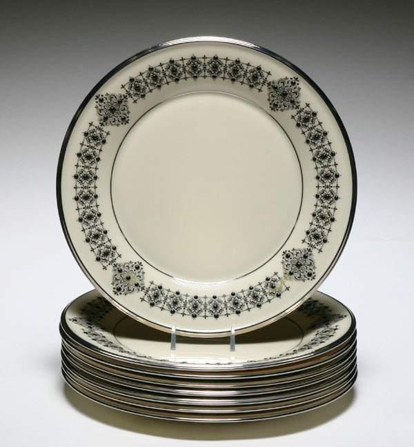 Appraisal: Eight Lenox platinum solitaire plates with hand painted accents Diam