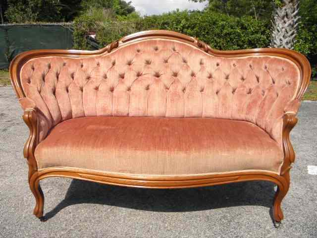 Appraisal: Victorian petite settee with mahogany frame on castors and rose