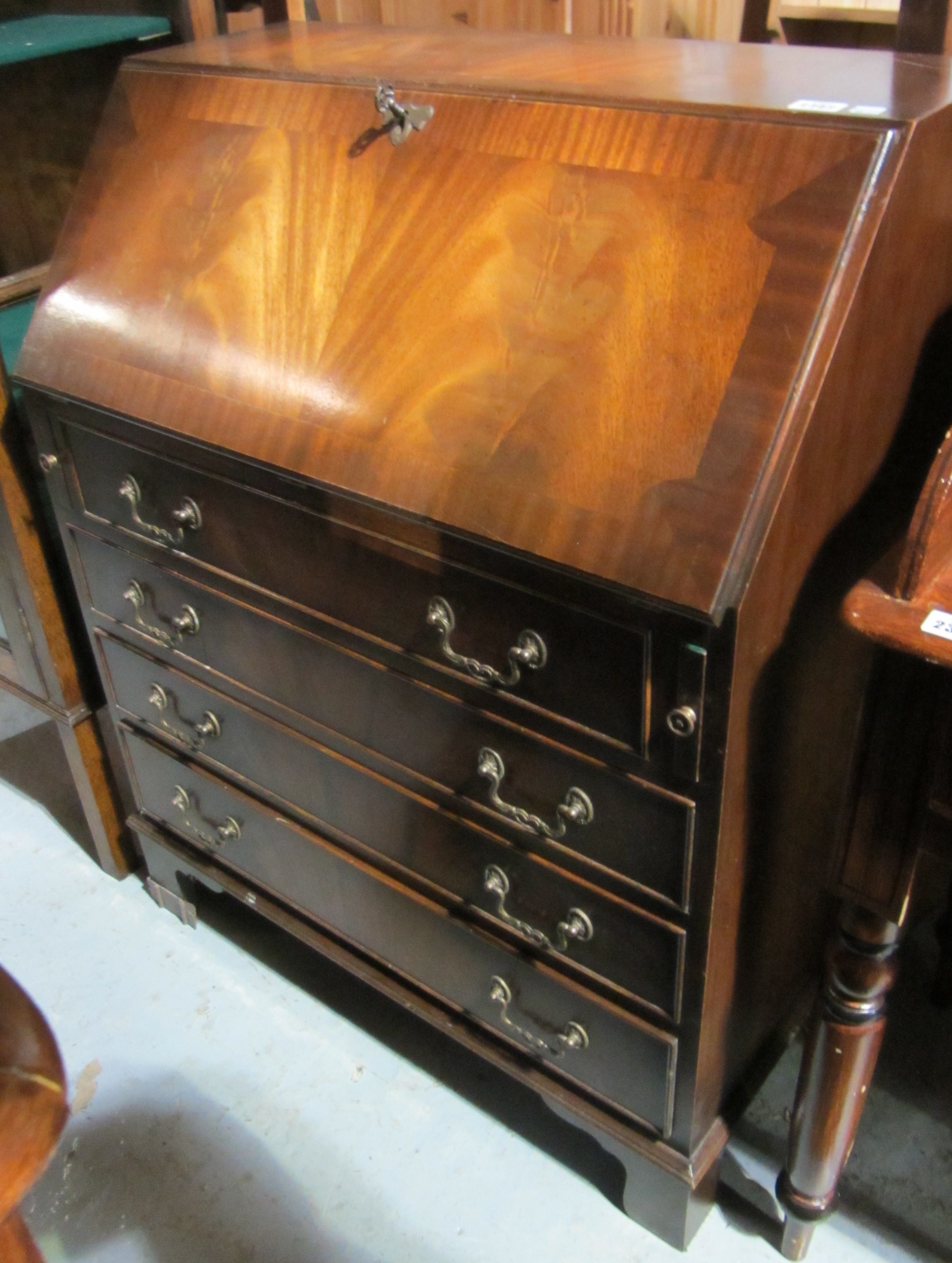 Appraisal: A th century mahogany bureau