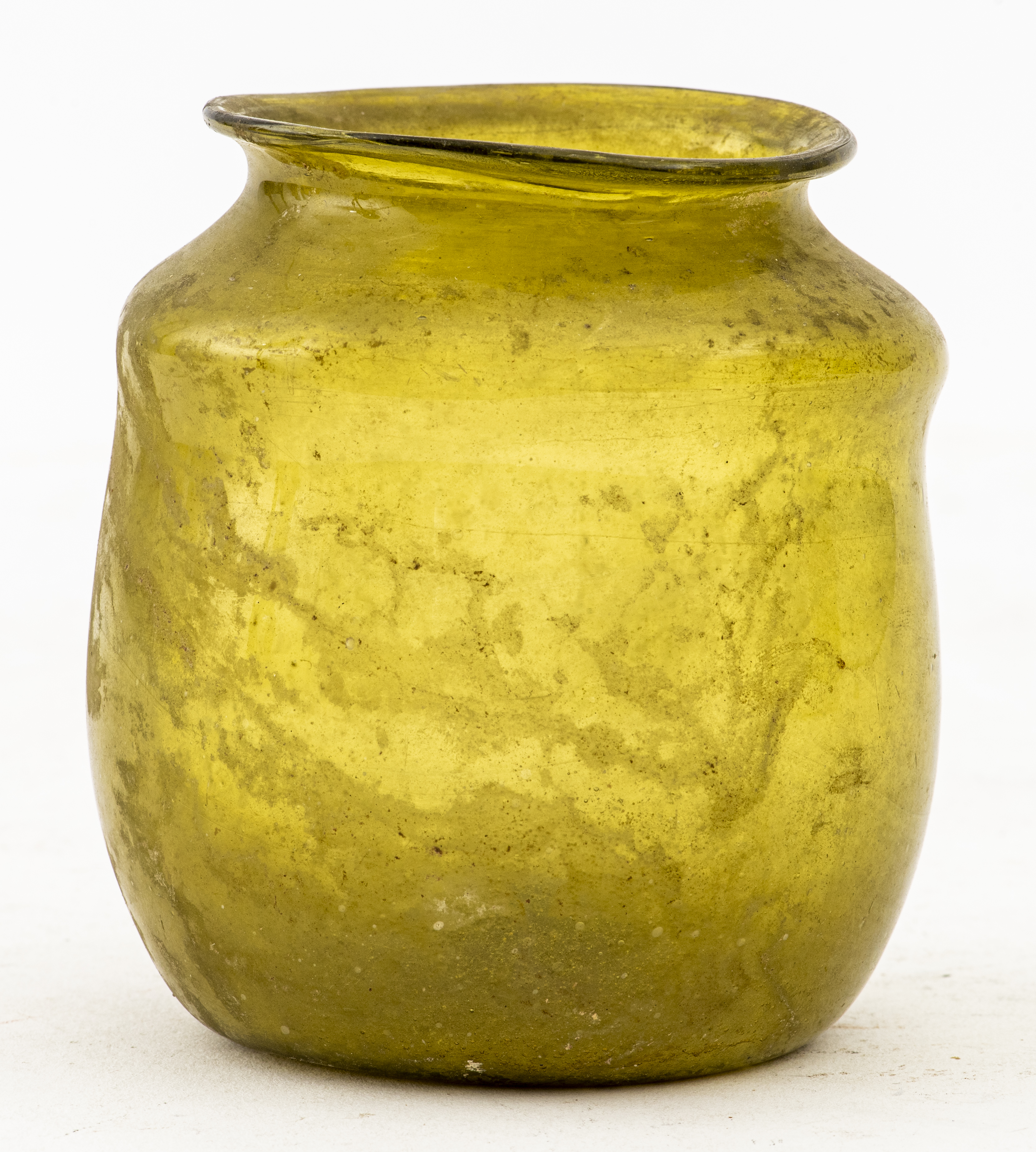 Appraisal: ANCIENT ISLAMIC GREEN GLASS JAR Islamic circa st to th