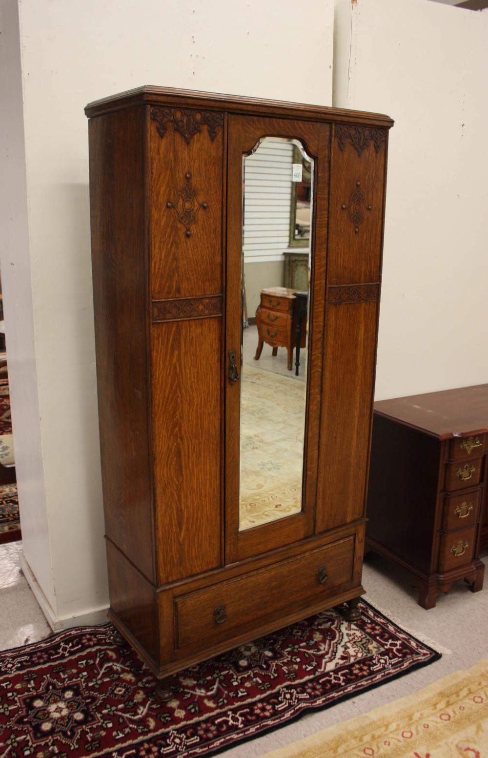 Appraisal: SINGLE-DOOR OAK WARDROBE English early th century the door having