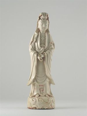 Appraisal: A Chinese blanc de Chine standing figure of Guanyin with