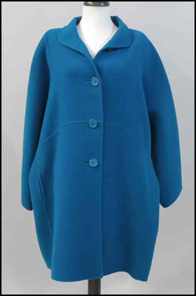 Appraisal: OSCAR DE LA RENTA BLUE WOOL COAT With dolman sleeves