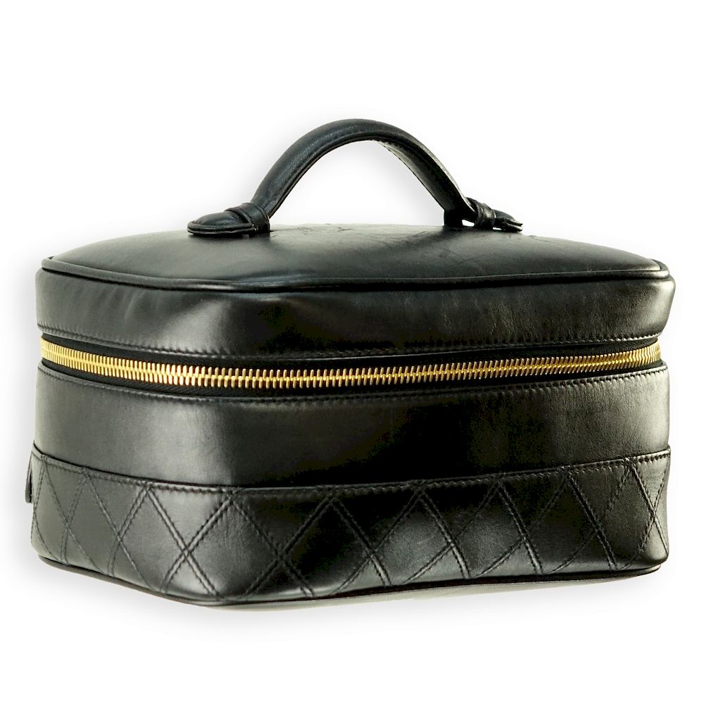 Appraisal: Chanel Black Quilted Leather Cosmetic Bag Chanel Black Quilted Leather