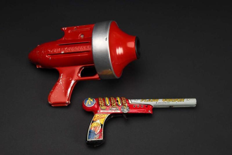 Appraisal: Lot of Flash Gordon Guns Description Both are working Includes