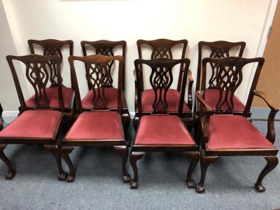 Appraisal: Eight mahogany dining chairs with pierced splat backs and loose