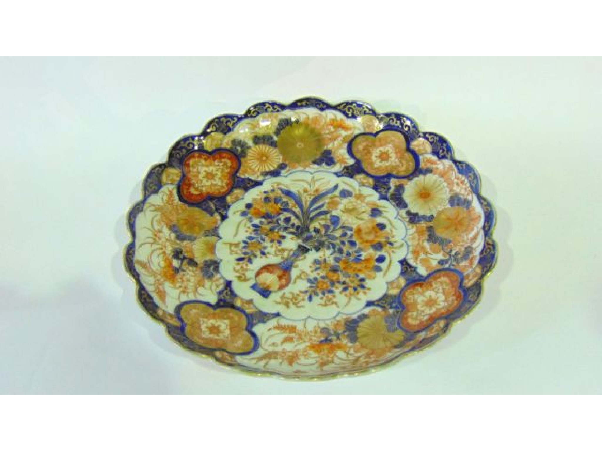 Appraisal: A th century Imari charger with shaped rim and painted