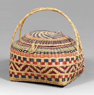 Appraisal: Monumental lidded Choctaw basket river cane with double handles multi-colored