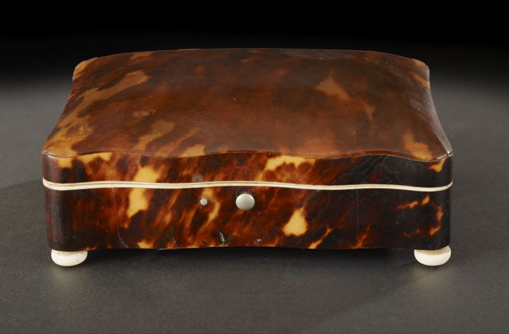 Appraisal: Edwardian Polished Bone-Edged Tortoiseshell Dressing Table Box first quarter th