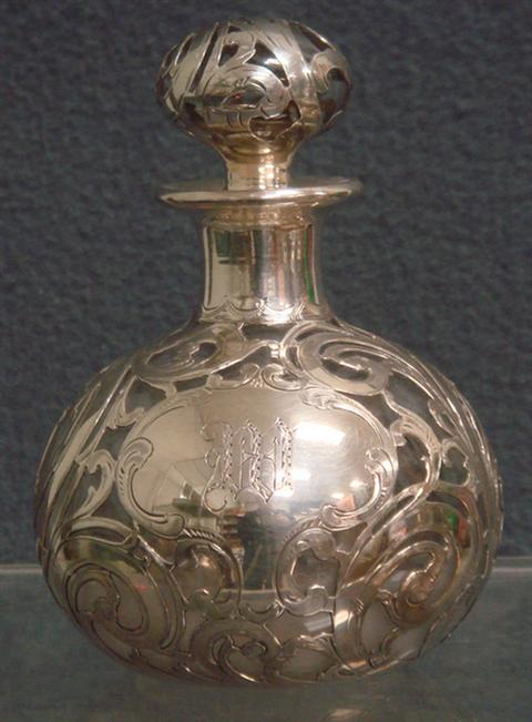 Appraisal: Silver overlay scent bottle round body height small chip on