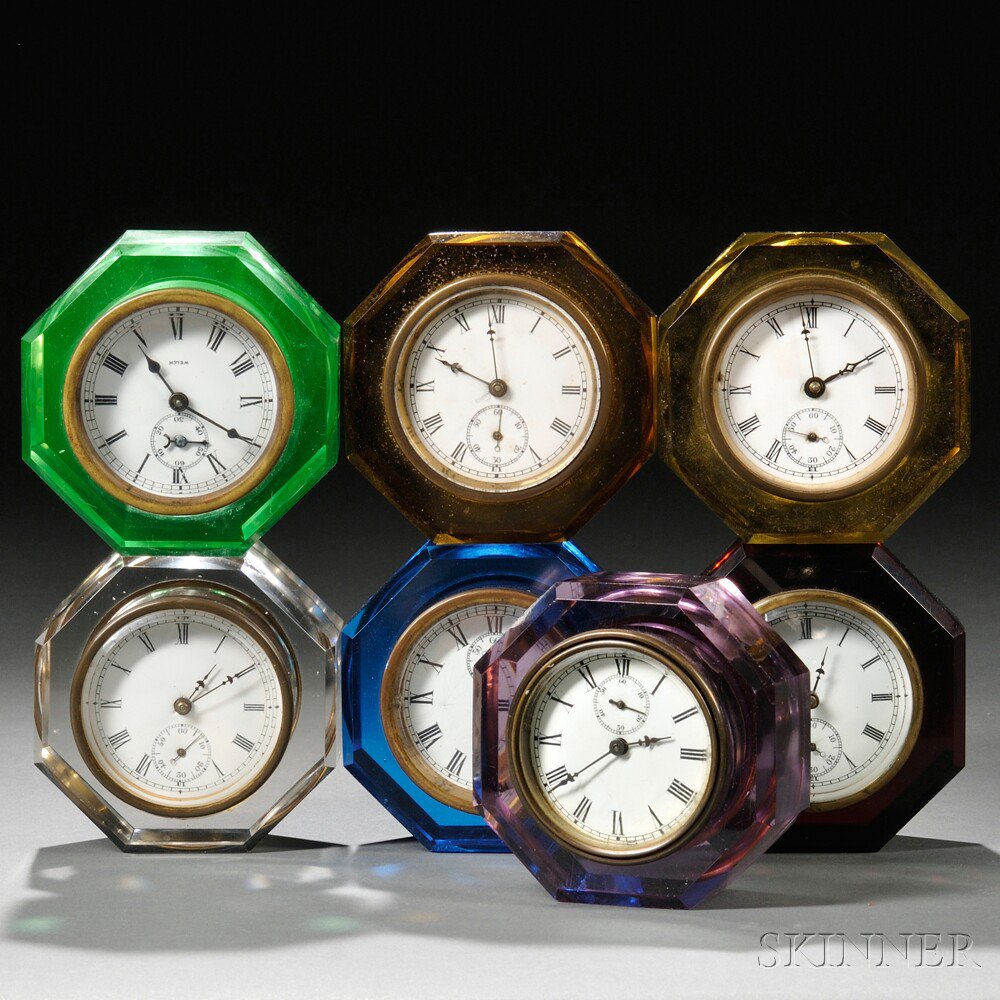 Appraisal: Seven E N Welch Jewel Paperweight Clocks c three striking