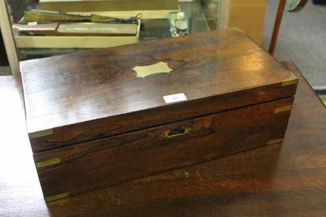 Appraisal: A TH CENTURY MAHOGANY WRITING SLOPE with fitted interior and