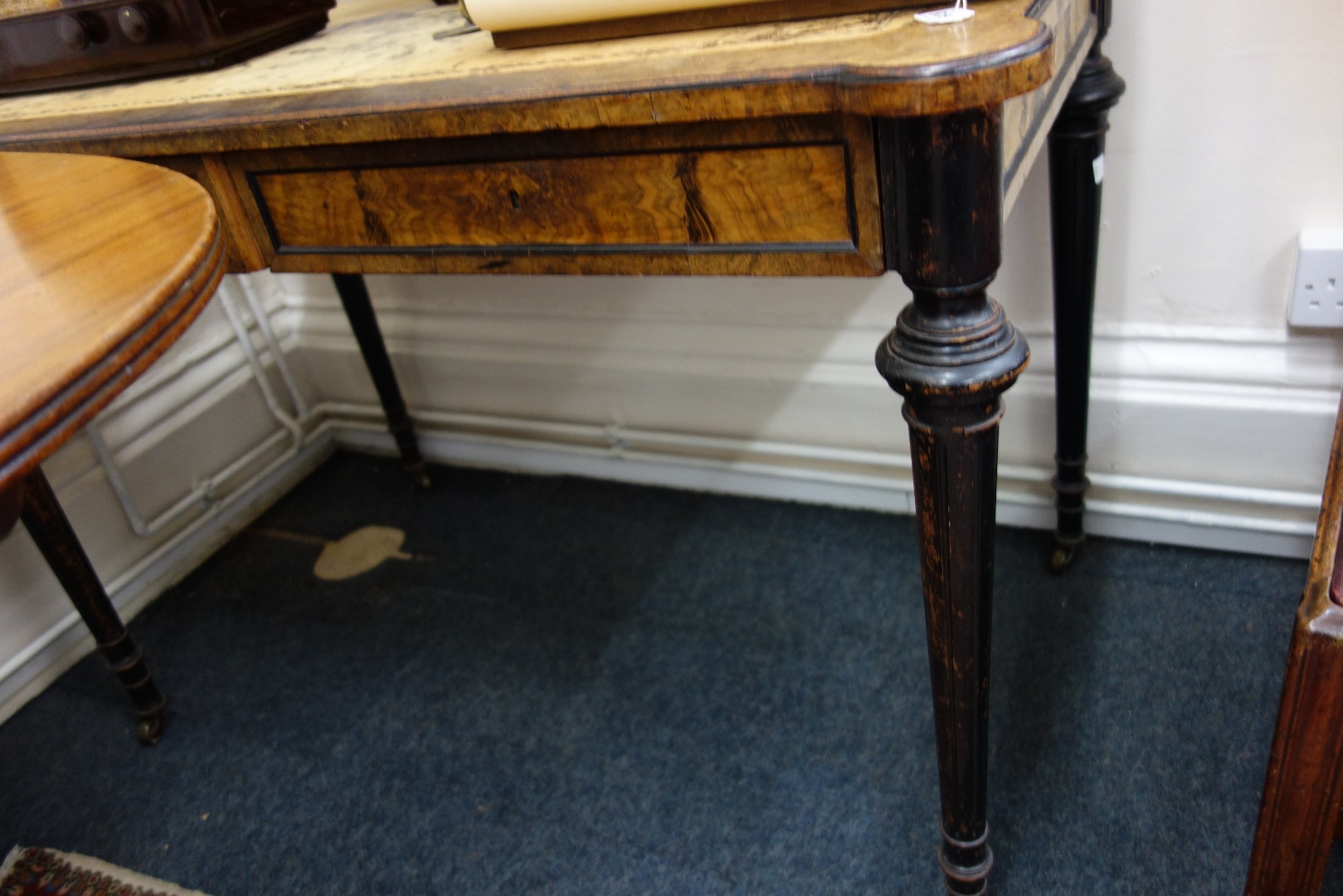 Appraisal: A French walnut and ebonised writing table circa with inset