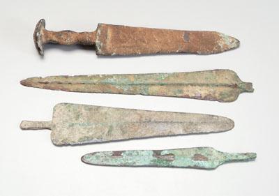 Appraisal: Four ancient bronze projectile points one a dagger probably Luristan