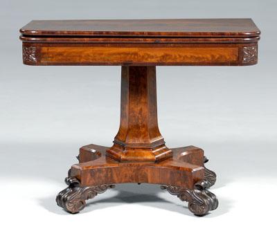 Appraisal: Boston classical games table highly figured mahogany veneers fold-over top