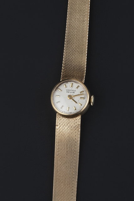 Appraisal: A lady's ct gold Revue wristwatch by Vertex the circular