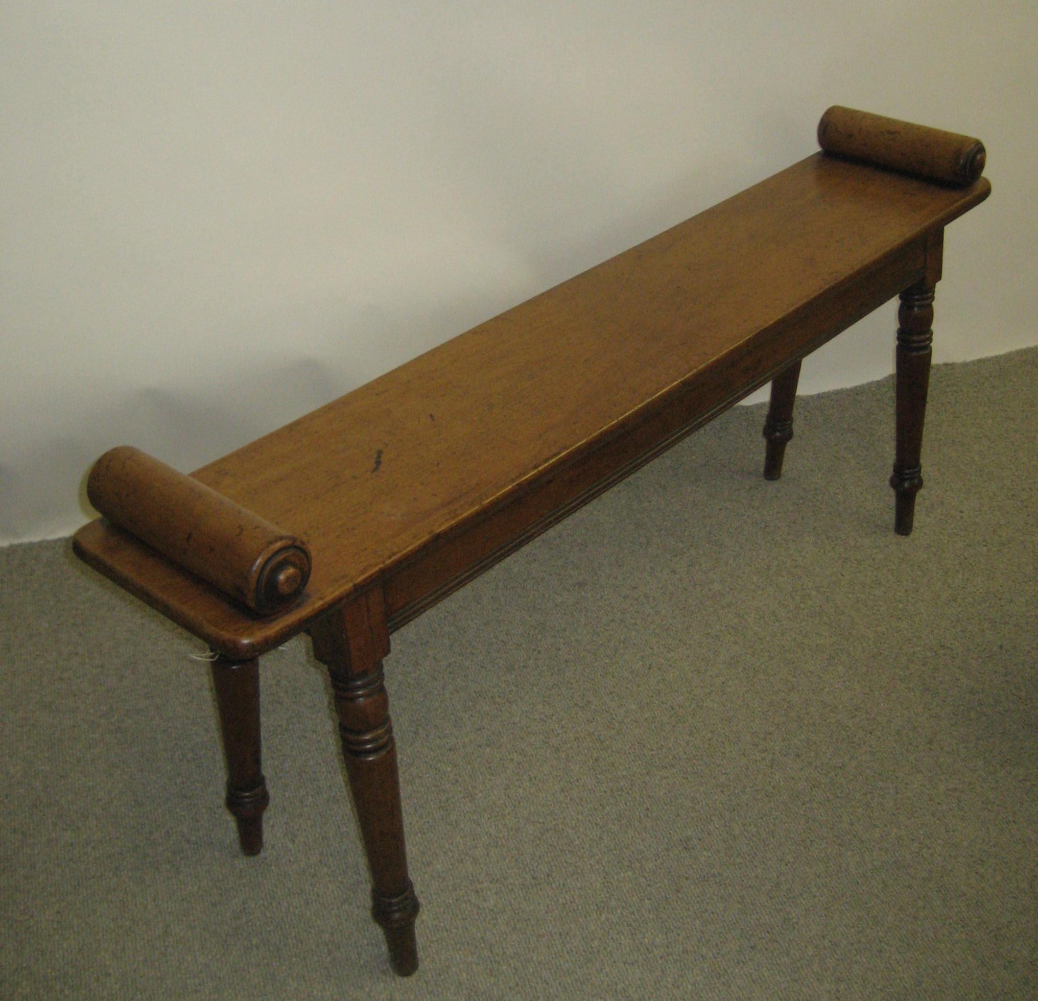 Appraisal: AN EARLY VICTORIAN MAHOGANY WINDOW SEAT the plank top with