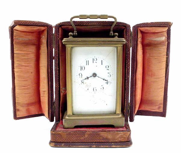 Appraisal: A brass carriage clock in a leather case height of