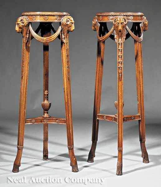 Appraisal: A Pair of Georgian-Style Carved Mahogany Fern Stands each with