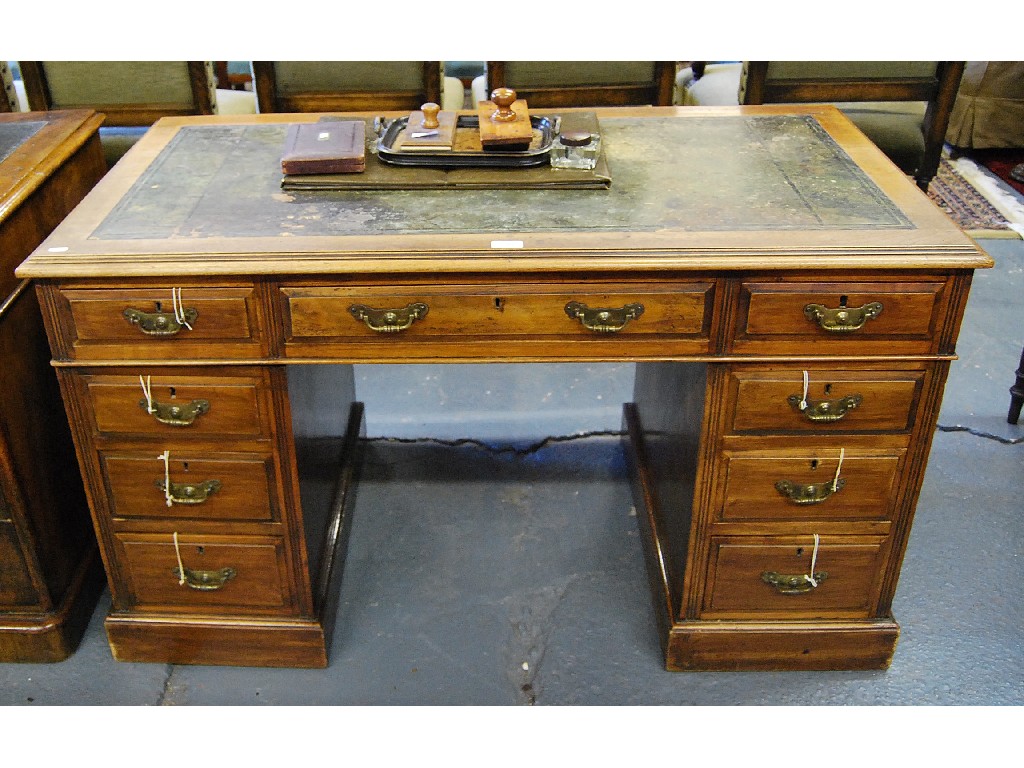 Appraisal: A late th century mahogany pedestal desk the top with