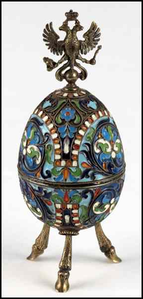 Appraisal: RUSSIAN CHAMPLEVE ENAMEL AND GILT SILVER EGG Having a Russian