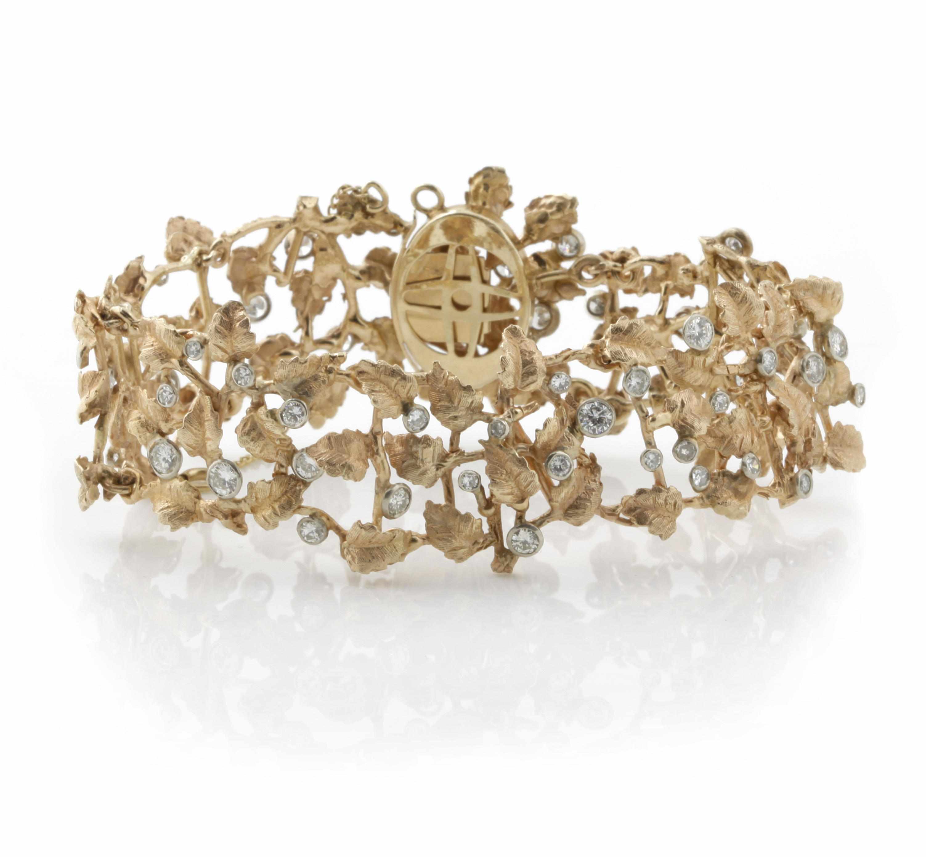 Appraisal: A diamond and k bicolor gold leaf motif bracelet estimated