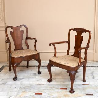 Appraisal: George II mahogany and walnut armchairs George II mahogany and