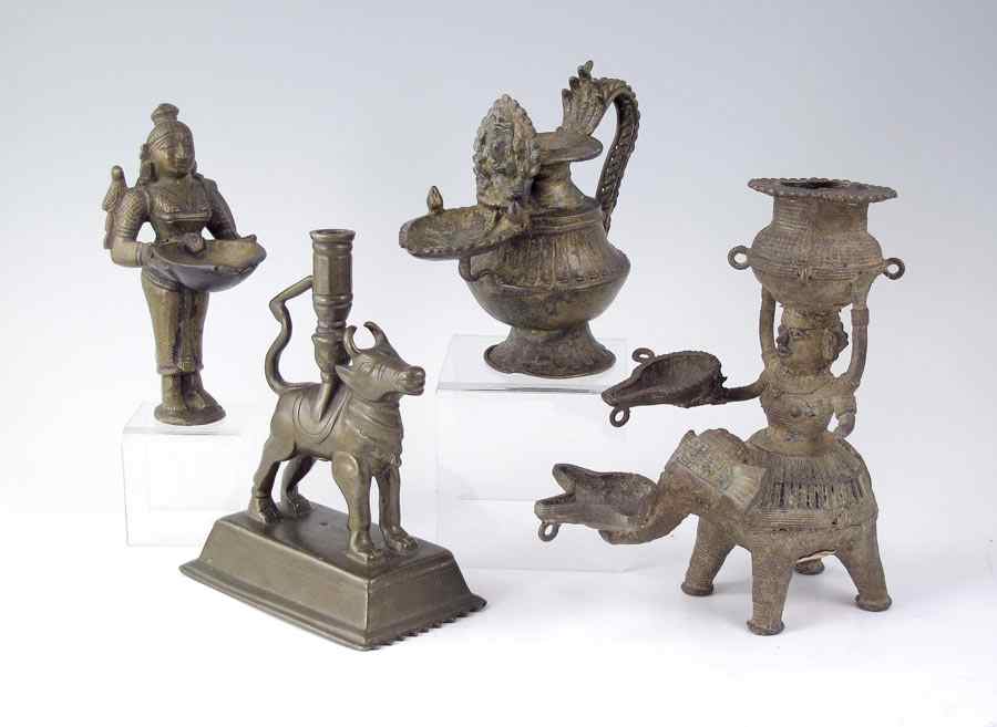 Appraisal: COLLECTION OF BRONZE CHUEH VESSELS Used as wine warming vessels